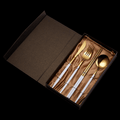 Gold with white handles