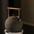 Ceramic Kettle Ball Shape Rattan Handle Handcrafted Tea Boiler